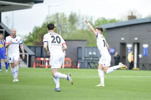 Nick Haughton celebrates his winning goal against Leamington Picture: STEVE MCLELLAN