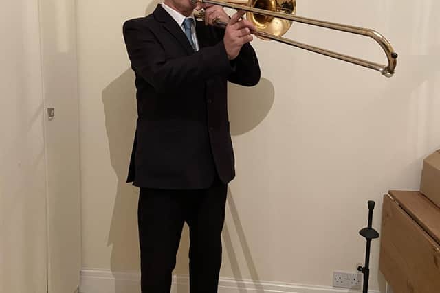 Concert organiser Colin O'Sullivan plays trombone in the Guardian Band