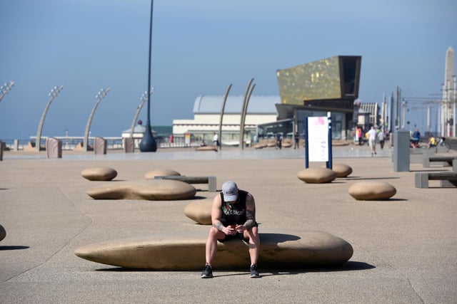 The sculpted pebbles double as seats where tourists can rest their legs, or sit and take in the sea views