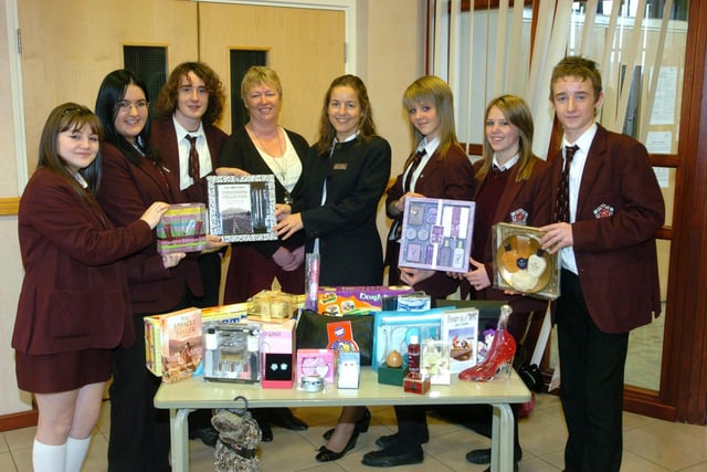 Pupils at Mongomery High School donated gifts to the Gazette Presents of Mind Appeal. L-R are Lauren Cholmondeley (14), Laura Catterall (14), Declan Cowlishaw (15), Pupil Voice Coordinator Debbie Park, Community Fundraiser for Brian House Jane Molyneux, Becky Holdich (14), Hayley Jackson (14) and Ben Richardson (14)