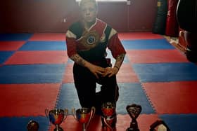 Sherry Dunn of Blackpool has qualified to represent England at kickboxing's Unified World Championships in Italy