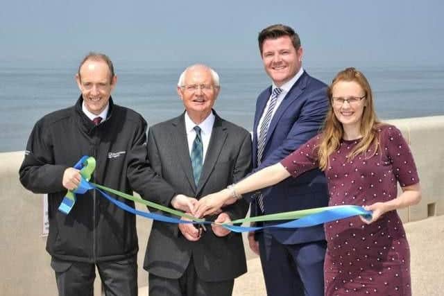 Fleetwood MP Cat Smith (right) and Wyre Council representatives cut the ribbon as the £63m Rossall Coastal Defence Scheme is opened in June 2018.