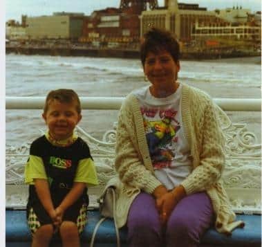 Chris was raised in Blackpool - pictured here, aged two, with his aunt Gina