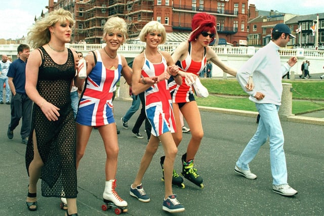 Pictures from the Body Positive and HEAL Walk for Life, on Blackpool promenade. Flying the Flag - some of the Funny Girls team.