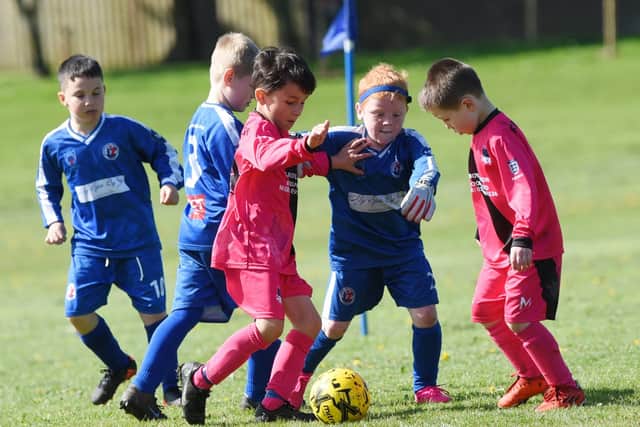 Under-7s action from Boundary Park between FC Rangers and Fleetwood Gym Wolves