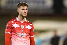 Barnsley striker John McAteeis wanted by four Championship clubs. Blackpool's promotion rivals may have to deal with a recall by Luton Town. (Image: Ben Roberts Photo/Getty Images