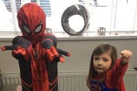 To the rescue! Charlie Sprigg, age 8, and Isla Sprigg, age 4, as Spider-Man and Superwoman.
