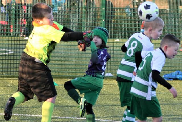 Action from the B&DYFL Under-8s Christmas Festival