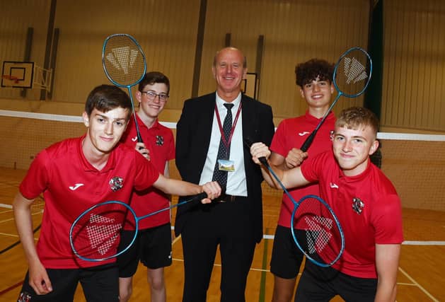Retiring PE school teacher John Armfield, pictured with pupils at St Aidan's Church of England High School, Preesall.