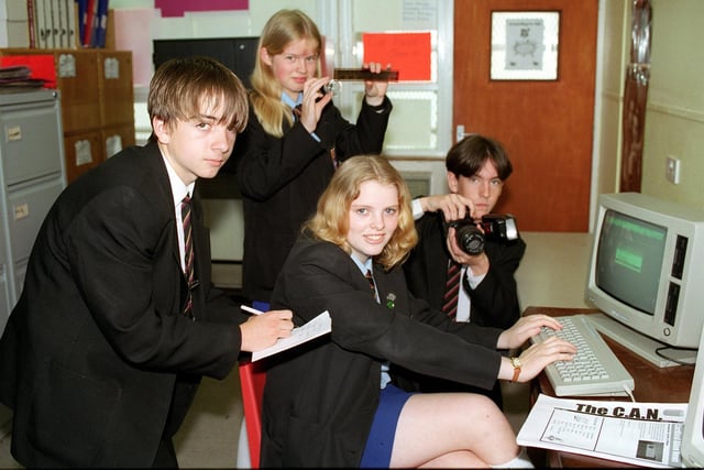 Jamie Page, Philippa Hoyle, Deni Bailey (seated) and Michael Todman producing their own newspaper in 1997