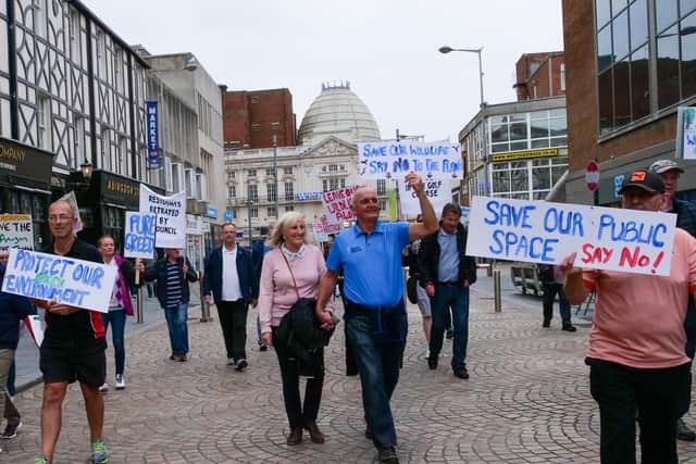 Campaigners marching through the town centre