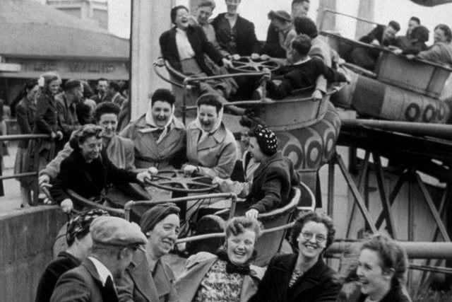 Holidaymakers enjoying fun on the Whip, a ride at Blackpool funfair, May 1936