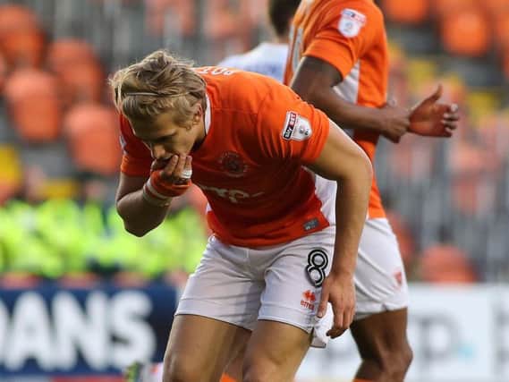 Brad Potts feels the pain after receiving an injury against Luton Town