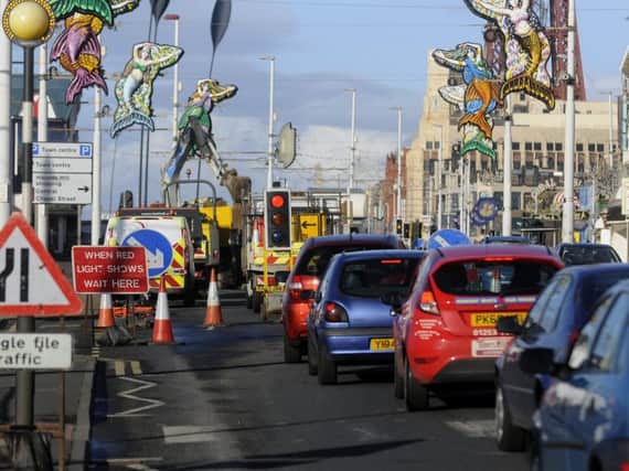 Tailbacks from the temporary lights on the Prom