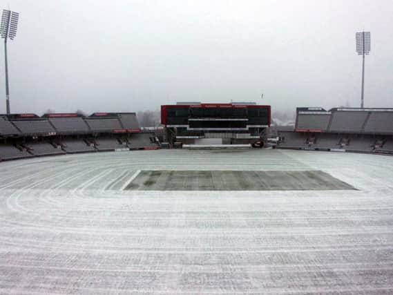 The snowy scene at Old Trafford on Tuesday