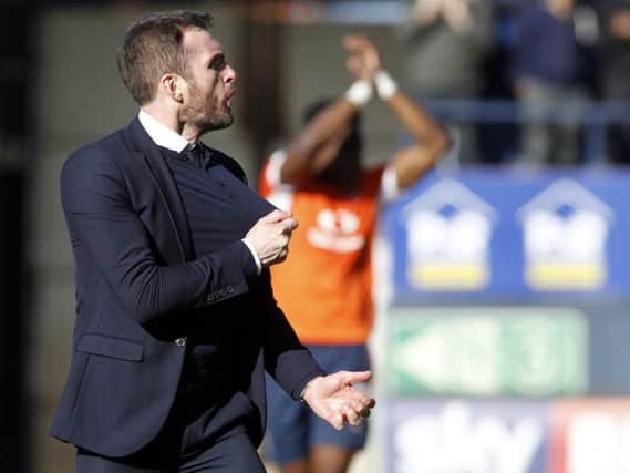 Luton boss Nathan Jones celebrates his side's win at the final whistle