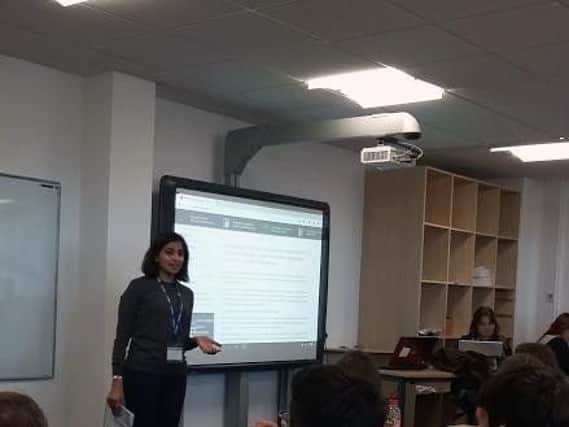 Asqa Mirza from Danbro  talking to Blackpool Sixth From students