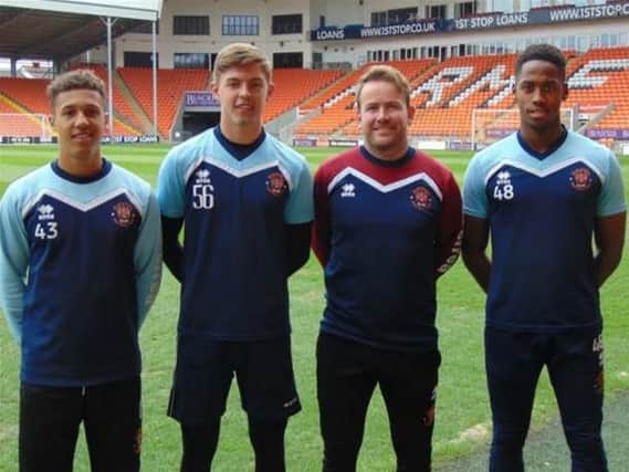 Academy manager Ciaran Donnelly pictured with the trio