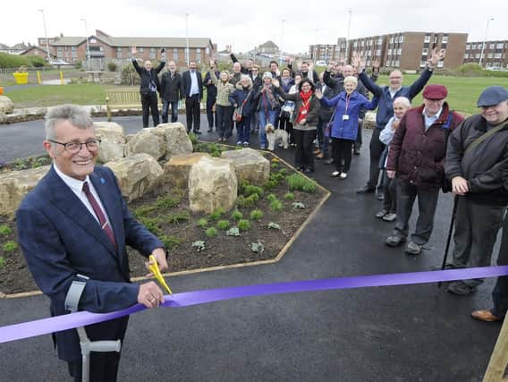 Opening of new dementia friendly garden at the Solaris Centre.  Pictured cutting the ribbon is  Peter Lyttle from Blackpool Dementia Action Alliance.