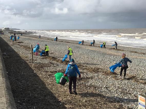 Volunteers clean up the beach at Rossall