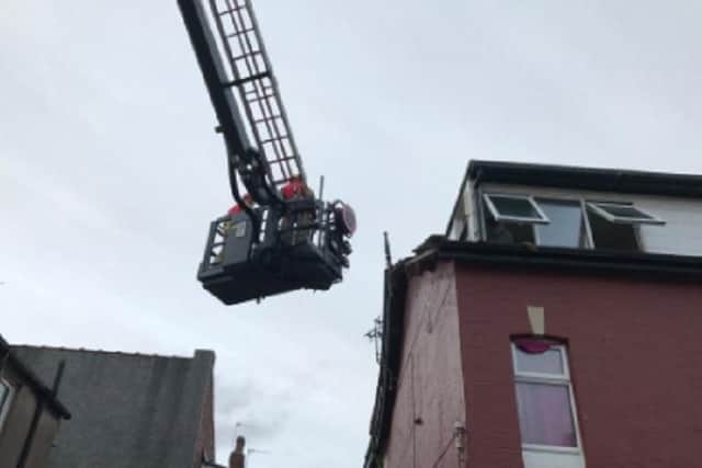Crews used an ALP to make the building safe