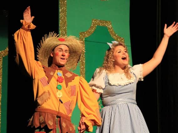 Reece Sibbald and Pippa Smith as Scarecrow and Dorothy