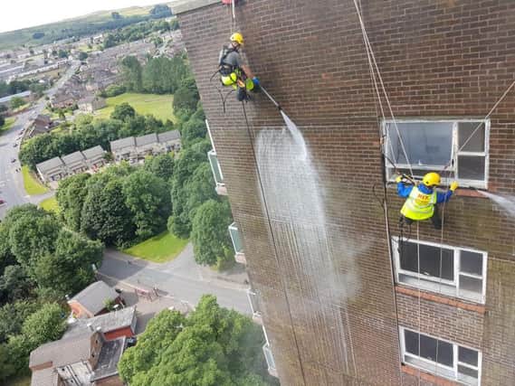 High Level Specialists experts at work high on a Halifax tower block