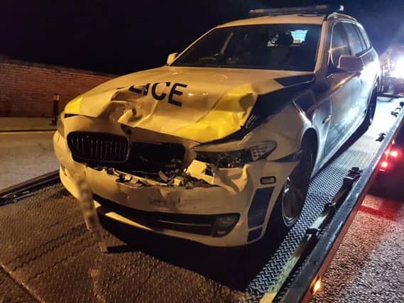 A police officer was injured after a stolen car was 'rammed' into a police car during a chase in Blackpool, the force said.