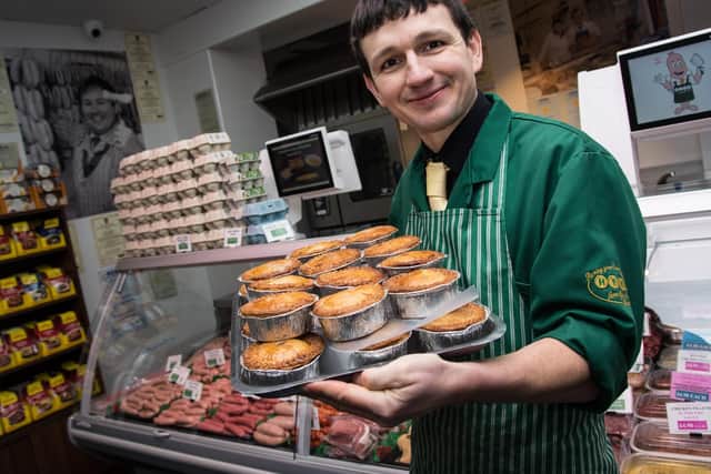 Danny Heys from Heys Family Butchers in Burnley with his pies for the  Lancashire Pork Pie Appreciation Society Awards Night