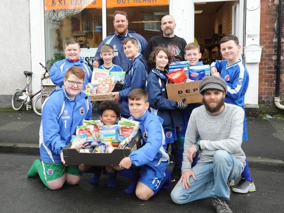 Fleetwood Gym U11s have donated food to the new Mustard Seed group shop