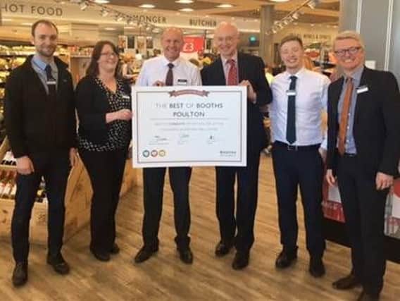 The Booths Poulton team picking up their award. Pictured left to right, Ben James, Helen Thwaite, Richard Sykes, Edwin Booth, Shane Hatton and Paul Tidswell