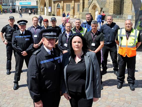 Police and council enforcement teams are joining forces in the town centre.  Lee Wilson and coun Gillian Campbell.
