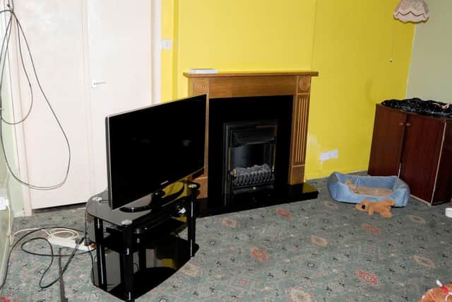 The lounge where Kenneth Coombes was murdered by Barbara Coombes in January 2016. Photo credit: Greater Manchester Police/PA