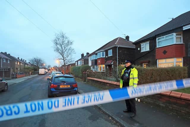 Police at the scene of an investigation at Matlock Road in Reddish on the outskirts of Manchester. Photo credit: Danny Lawson/PA Wire