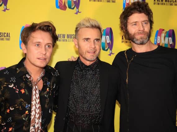 (left-right) Mark Owen, Gary Barlow, and Howard Donald of Take That, who have announced a huge UK arena tour and greatest hits album to mark their 30th anniversary next year. Photo credit: Peter Byrne/PA Wire