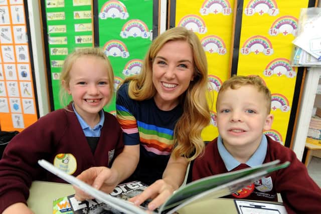 Maddie Moate from CBeebies with Neveah Fenton, seven, and Harrison Birtle, six.