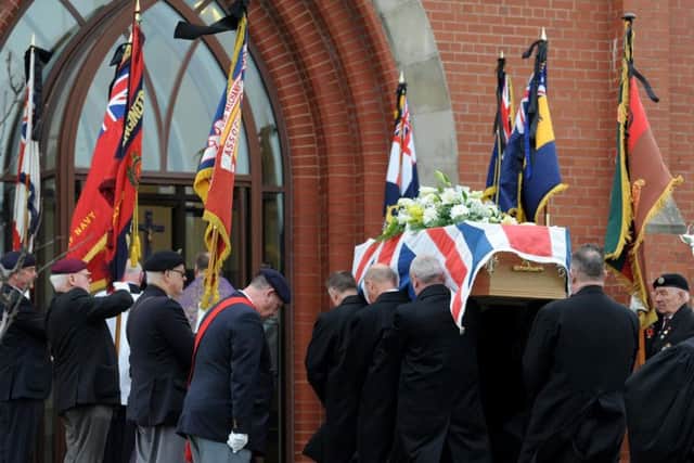 The coffin as it arrived at the church for the funeral of Henry Mitchell