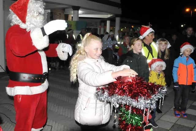 Emily Briggs switches on the Christmas tree lights at Fleetwood
