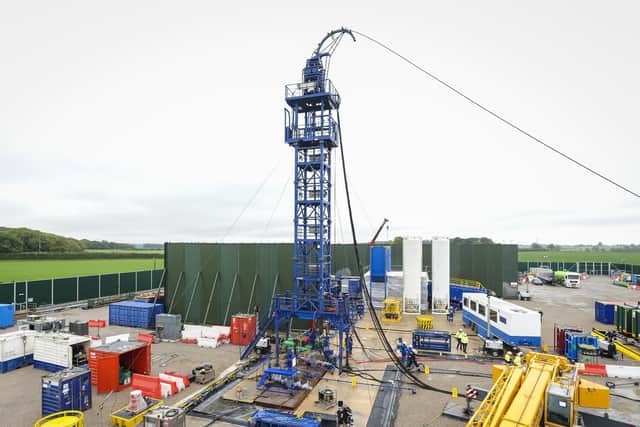 Cuadrilla's fracking equipment with the tower and steel tubing used to extract the gas from deep-lying rocks seen in October 2018. The green acoustic barrier can be seen behind the tower.