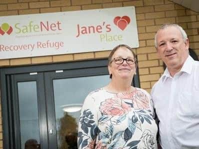 John and Penny Clough outside the Jane's Place refuge in Burnley