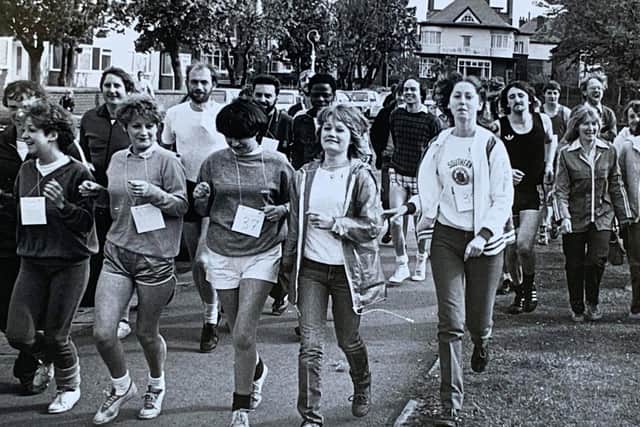 Students and staff taking part in a 12 mile sponsored run in the aid of the international year of disabled people.