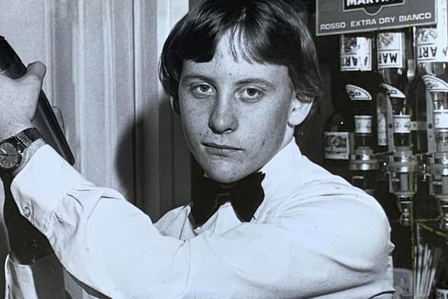 Ian McKenzie shaking a cocktail.