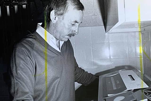 Student Tony Pegg reading the X-ray of a weld.