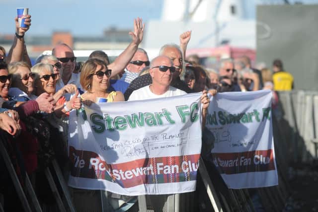 Dedicated fans on the front row.