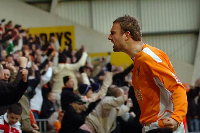 Evatt celebrates after scoring against Norwich City in the FA Cup