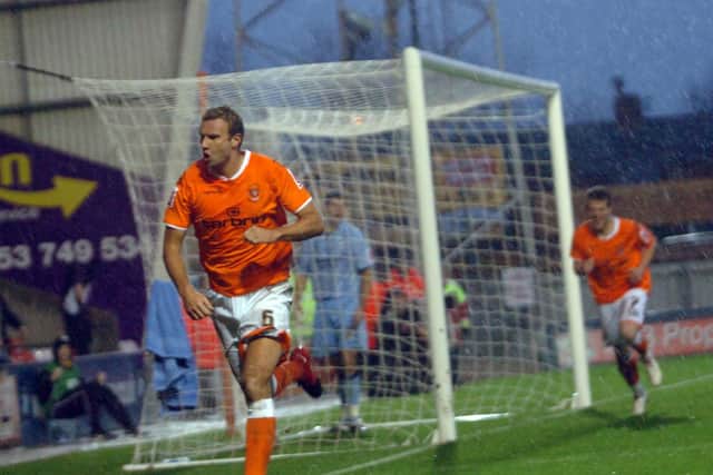 Evatt celebrates a goal against Scunthorpe United