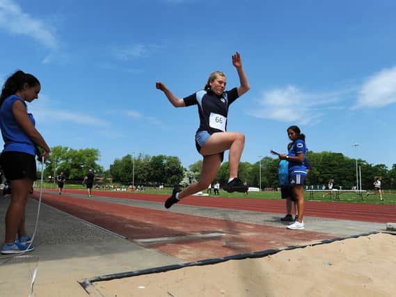 Lara Newell of St Bede's in the long jump