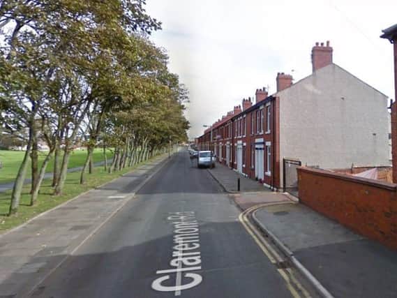 The robbery took place as the man walked along Claremont Road t