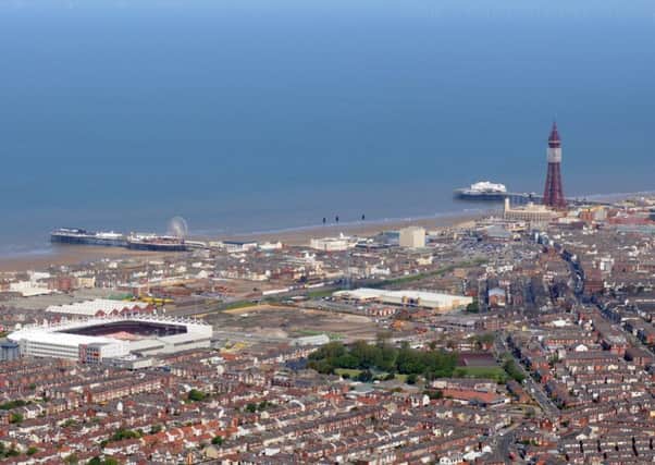 Aerial photographs of Blackpool's Bloomfield Road stadium, Blackpool Tower and North and Central Piers