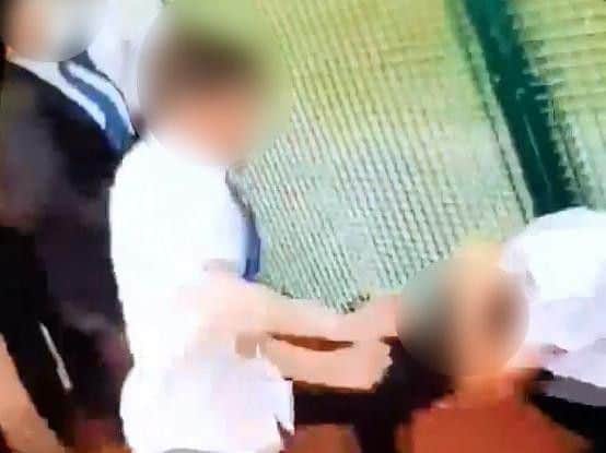 Headteacher Simon Eccles has excluded both the attacker and the boy who filmed it
